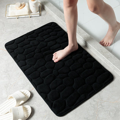 Le tapis de bain avec motif en relief de pavés BERDA™
